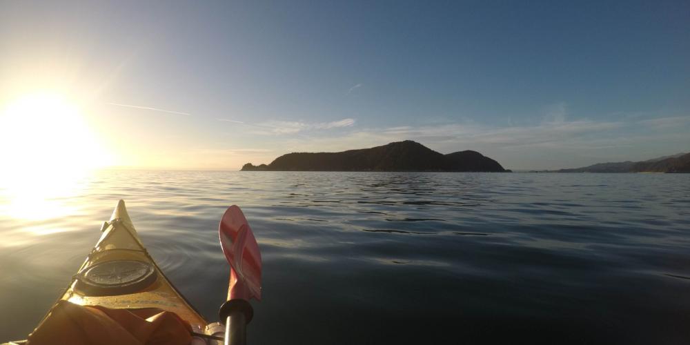 MSK Kayaking with the sunrise Marahau Sea Kayaks